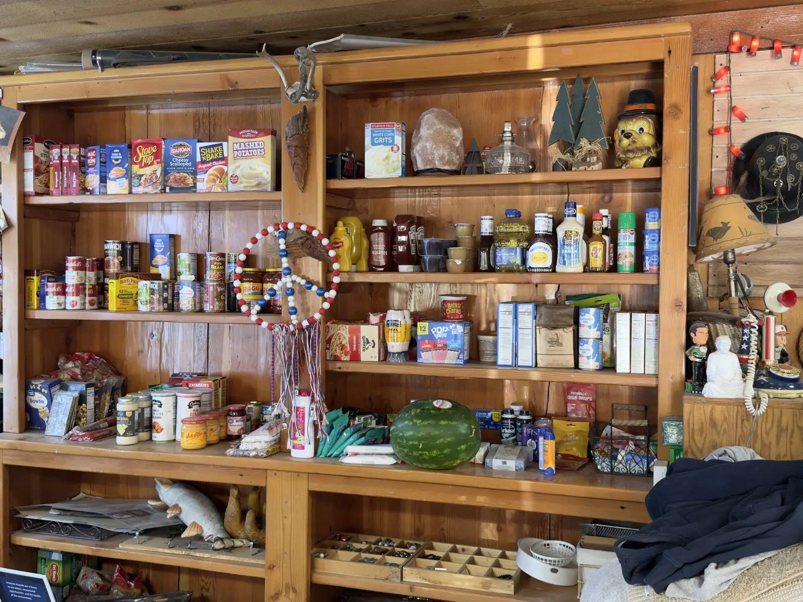 Camp staples on the pantry shelves.