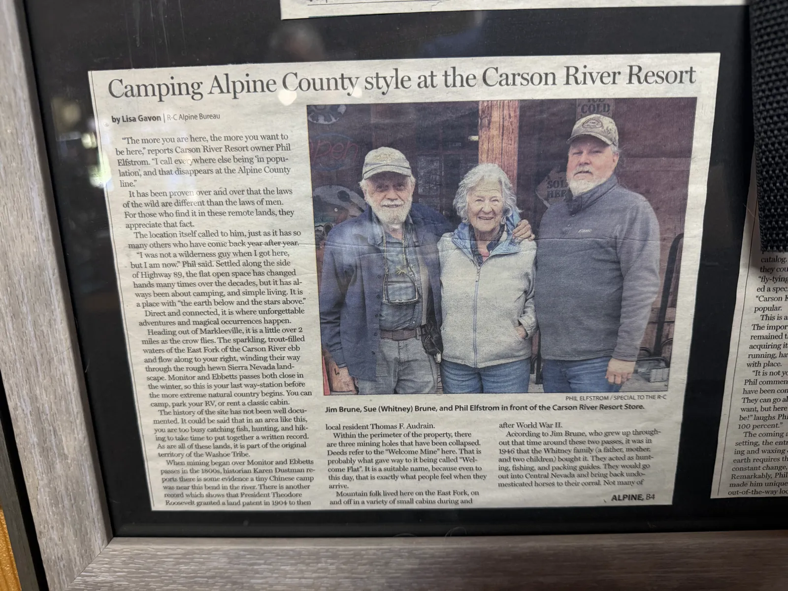 Framed on the wall: the Record-Courier's story on the resort — Phil and the Brunes in front of this store.