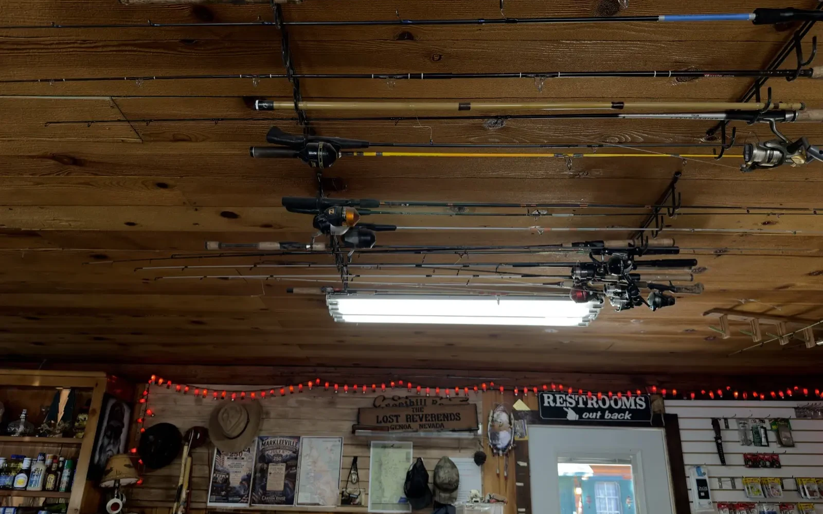 Rods overhead, the store's own rafters.